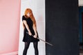 Portrait of a beautiful girl with a Japanese sword cosplayer anime Japan Royalty Free Stock Photo