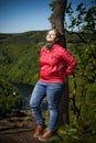 Portrait of a girl leaning against a tree at the lookout Maj Royalty Free Stock Photo