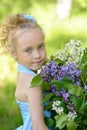 Portrait of girl with lilacs Royalty Free Stock Photo