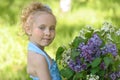 Portrait of girl with lilacs Royalty Free Stock Photo