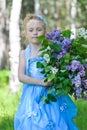 Portrait of girl with lilacs Royalty Free Stock Photo
