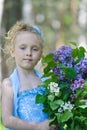 Portrait of girl with lilacs Royalty Free Stock Photo