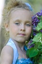 Portrait of girl with lilacs Royalty Free Stock Photo