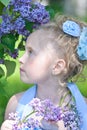 Portrait of girl with lilacs Royalty Free Stock Photo