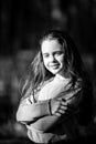 Portrait of a girl with long hair in the park. Royalty Free Stock Photo