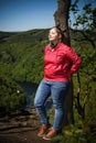 Portrait of a girl looking on view of Vltava river horseshoe shape from Maj viewpoint in Czech republic