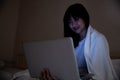 Portrait of girl lying on floor in bedroom at night Royalty Free Stock Photo