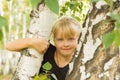 Portrait of a girl near birch