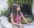 Portrait of a girl near a fountain