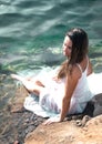 Portrait of a girl near a pond Royalty Free Stock Photo