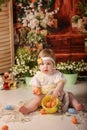 Portrait girl one year old shooting in the studio in the background flowers wooden background dekor