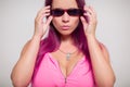 Portrait girl in pink clothes with sunglasses Royalty Free Stock Photo