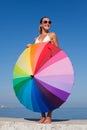 Portrait of girl with rainbow parasol Royalty Free Stock Photo