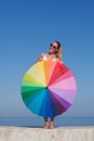 Portrait of girl with rainbow parasol