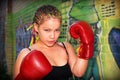 Portrait of a girl with red boxing gloves