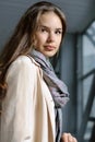 Portrait of a girl with a scarf around her neck