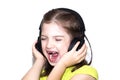 Portrait of a girl of seven years in headphones.