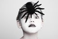 Portrait of the scary girl with spider Royalty Free Stock Photo