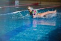 Portrait of girl sport butterfly swimming