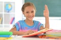 Portrait of girl studing with books at classroom Royalty Free Stock Photo