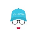 Portrait of a Girl Volunteer in glasses and cap.