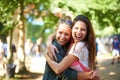 Portrait, girls or happy friends hug at music festival outdoor, event or bonding at concert. Face, embrace or women