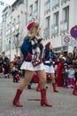 Portrait of girls with sexy costume of cheerleader parading in the street Royalty Free Stock Photo