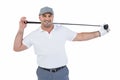 Portrait of golf player holding a golf club Royalty Free Stock Photo