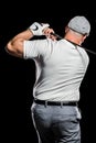 Portrait of golf player taking a shot Royalty Free Stock Photo