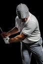 Portrait of golf player taking a shot Royalty Free Stock Photo
