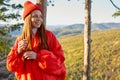 Portrait of good-looking fit redhead woman is travelling on mountains Royalty Free Stock Photo