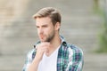 Portrait good looking man casual style, thoughtful mood concept