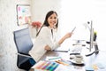 Woman graphic designer in her office Royalty Free Stock Photo