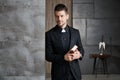 Portrait of good-looking young catholic priest