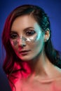 Portrait of gorgeous glam girl, artistic glittering make-up on a