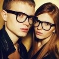 Portrait of gorgeous red-haired fashion twins in black clothes Royalty Free Stock Photo