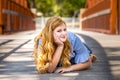 Portrait of gorgeous smiling teenage girl with red hair outdoors Royalty Free Stock Photo