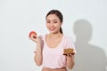 Portrait of a gorgeous young asian woman and food choices