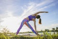 Portrait of gorgeous young woman practicing yoga with nature background Royalty Free Stock Photo