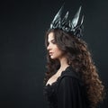 Portrait of a Gothic Princess. Gothic Queen. Image on Halloween. Young beautiful woman in black Royalty Free Stock Photo