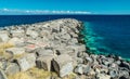 Portrait graffiti art of famous artists, musicians and singers on stones of breakwater in the Santa Cruz de Tenerife. Editorial Royalty Free Stock Photo