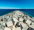 Portrait graffiti art of famous artists, musicians and singers on stones of breakwater in the Santa Cruz de Tenerife. Editorial Royalty Free Stock Photo