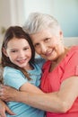 Portrait of grandmother and granddaughter embracing Royalty Free Stock Photo