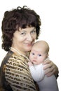 Portrait of a grandmother holding her beloved granddaughter Royalty Free Stock Photo