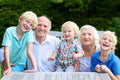 Portrait of grandparents with grandkids