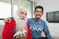 Portrait of grandson and grandfather smiling in house Royalty Free Stock Photo