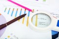Portrait of graph, pen, pencil and magnifying glass Royalty Free Stock Photo