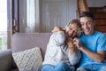 Portrait of grateful teenager man hug smiling middle-aged mother show love and care, thankful happy grown-up son in embrace Royalty Free Stock Photo