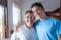 Portrait of grateful teenager man hug smiling middle-aged mother show love and care, thankful happy grown-up son in embrace Royalty Free Stock Photo