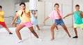 Portrait of group of boys and girls having dancing class in studio